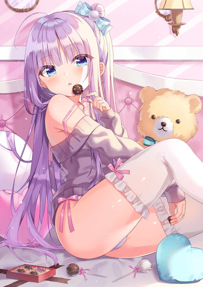 1girl :o absurdres ahoge arm_between_legs bare_shoulders bed bed_sheet blue_eyes blush box bra_strap candy commentary eyebrows_visible_through_hair food gift gift_box hair_between_eyes hair_bun hair_ribbon heart heart_pillow highres holding_chocolate holding_lollipop indoors knee_up lollipop long_hair looking_at_viewer off-shoulder_sweater off_shoulder on_bed original panties pillow purple_hair ribbon shiny shiny_hair siooooono sitting sitting_on_bed solo stuffed_animal stuffed_toy sweater teddy_bear thigh-highs underwear wall_lamp white_legwear white_panties