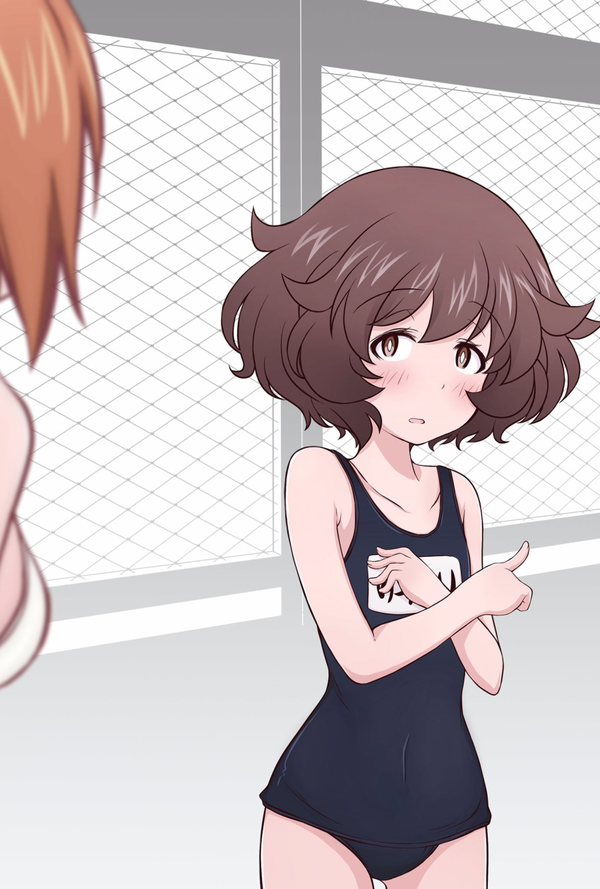 2girls akiyama_yukari bangs black_swimsuit blurry blurry_foreground blush brown_eyes brown_hair chain-link_fence commentary depth_of_field eyebrows_visible_through_hair fence girls_und_panzer hadzuki_haru highres looking_at_another messy_hair multiple_girls name_tag nishizumi_miho one-piece_swimsuit open_mouth out_of_frame pointing school_swimsuit short_hair standing swimsuit