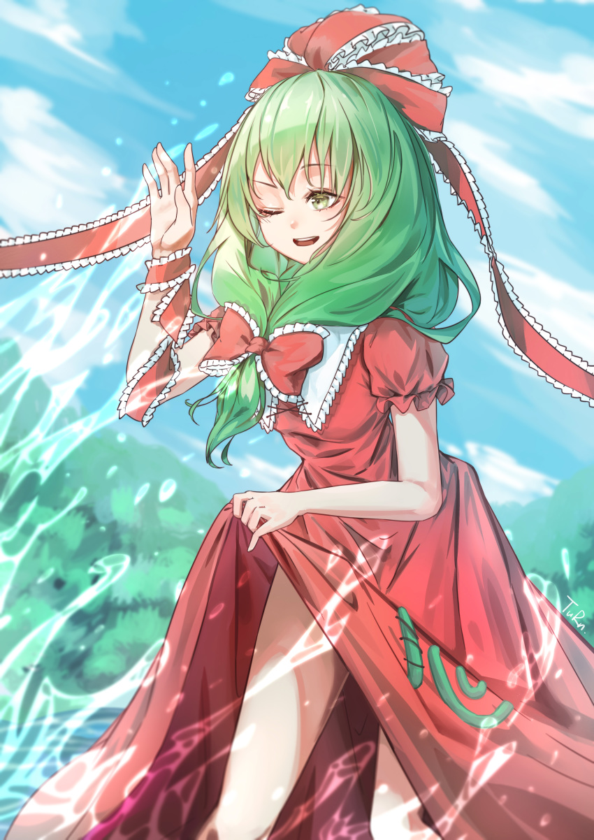 1girl :d absurdres arm_ribbon bangs blue_sky bow clouds day dress frilled_bow frilled_shirt_collar frills front_ponytail green_eyes green_hair hair_ribbon hand_up highres kagiyama_hina long_hair one_eye_closed open_mouth outdoors puffy_short_sleeves puffy_sleeves red_dress ribbon river short_sleeves signature skirt skirt_lift sky smile solo splashing touhou turn_zhuan water