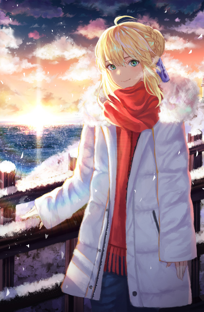 1girl ahoge artoria_pendragon_(all) bangs blonde_hair blue_eyes blue_ribbon braid braided_bun breath clouds coat commentary cowboy_shot elker evening eyebrows_visible_through_hair fate/stay_night fate_(series) green_eyes hair_between_eyes hair_ribbon highres lighthouse long_sleeves looking_at_viewer multicolored multicolored_eyes ocean outdoors railing red_scarf ribbon saber scarf short_hair sidelocks sleeves_past_wrists smile snow snowing standing sunset white_coat winter winter_clothes