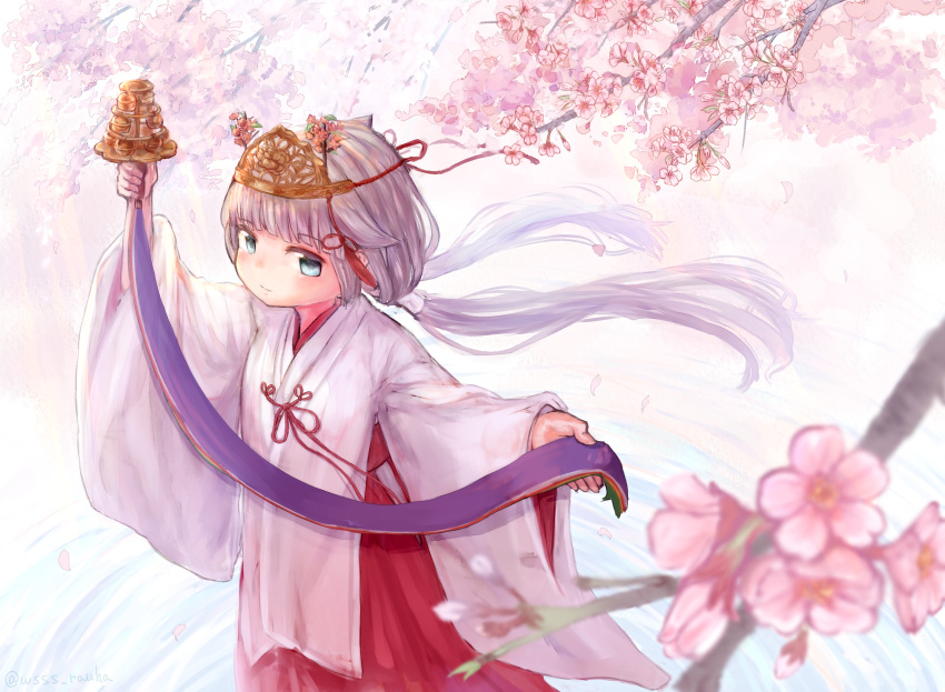 1girl alternate_costume bangs bell blue_eyes blunt_bangs blush branch bud cherry_blossoms eyebrows_visible_through_hair flower hair_flower hair_ornament highres holding japanese_clothes jingle_bell kagura_suzu kantai_collection kimono light_brown_hair long_hair long_sleeves low_twintails maetenkan miko mikura_(kantai_collection) smile solo tree twintails water wide_sleeves wss_(nicoseiga19993411)