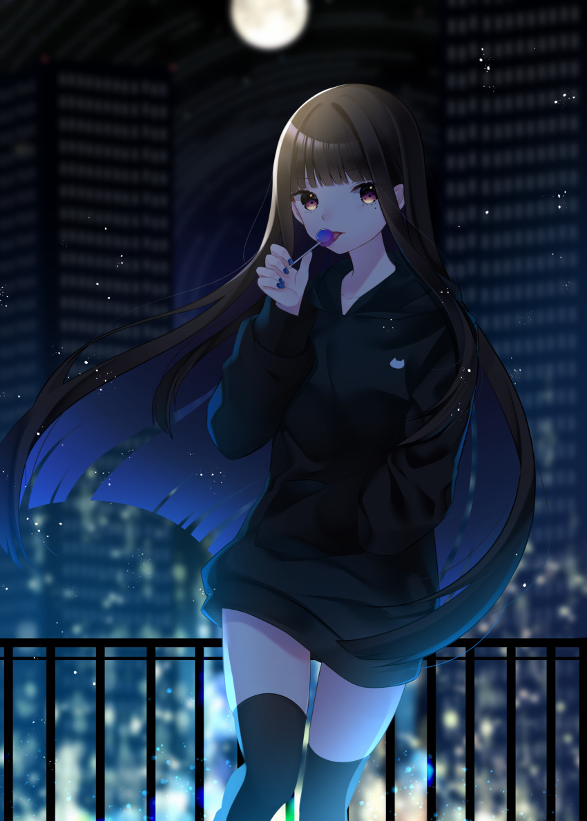 1girl arm_up bangs black_hoodie black_legwear blue_nails blurry blurry_background brown_eyes brown_hair building cacao_(cacaomgmg) candy city_lights cityscape commentary_request contrapposto feet_out_of_frame fingernails food full_moon hand_in_pocket highres holding holding_candy holding_food hood hood_down hoodie light_particles lollipop long_hair looking_at_viewer moon nail_polish night original outdoors railing sidelocks skyscraper solo standing thigh-highs tongue tongue_out very_long_hair