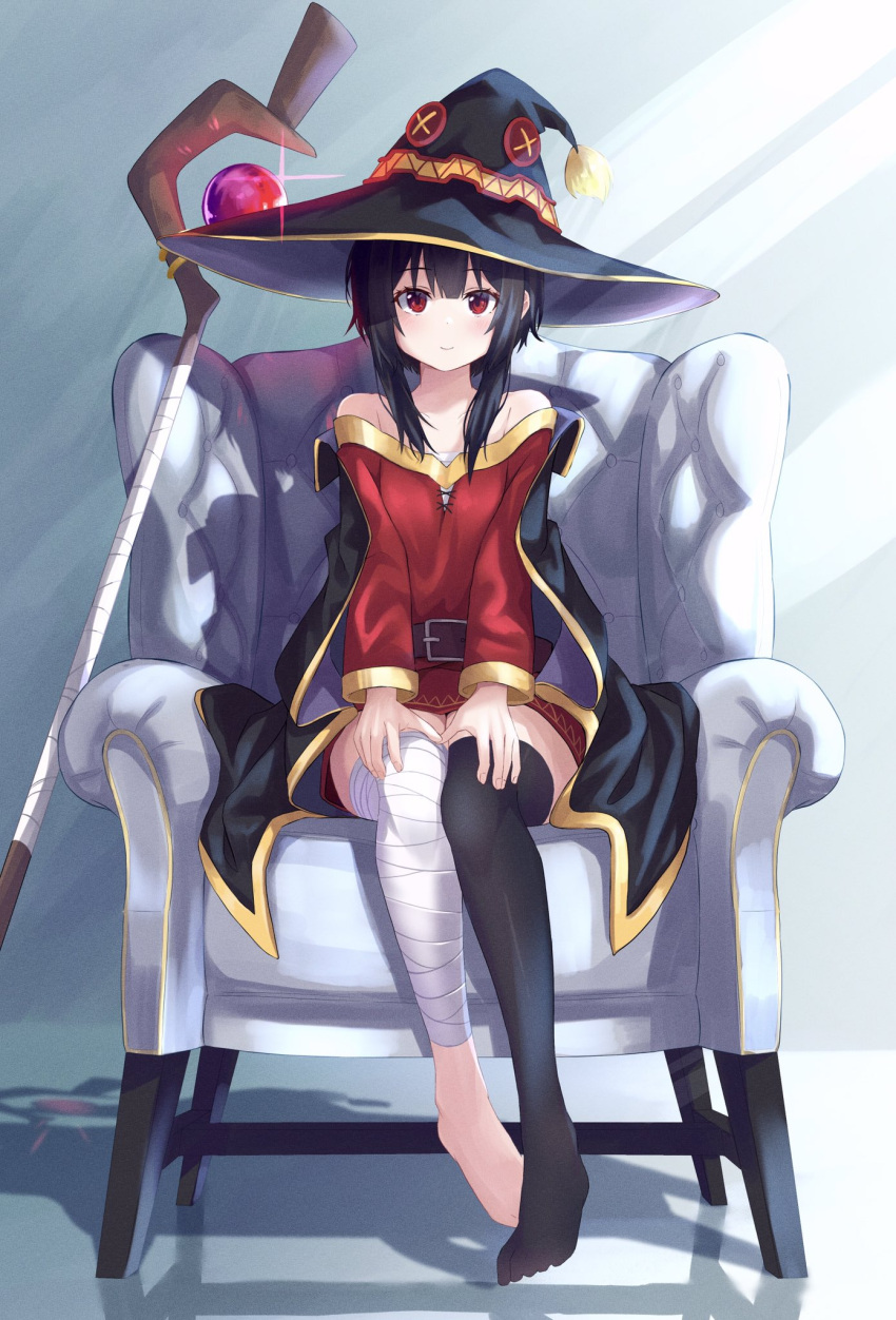 1girl armchair bandaged_leg bandages bangs bare_shoulders barefoot belt black_cape black_hair black_legwear blush breasts brown_belt cape chair collar collarbone commentary_request dress full_body hat highres kiona_(giraffe_kiona) kono_subarashii_sekai_ni_shukufuku_wo! long_sleeves looking_at_viewer megumin off-shoulder_dress off_shoulder red_dress red_eyes short_hair short_hair_with_long_locks single_thighhigh sitting small_breasts smile solo staff thigh-highs witch_hat