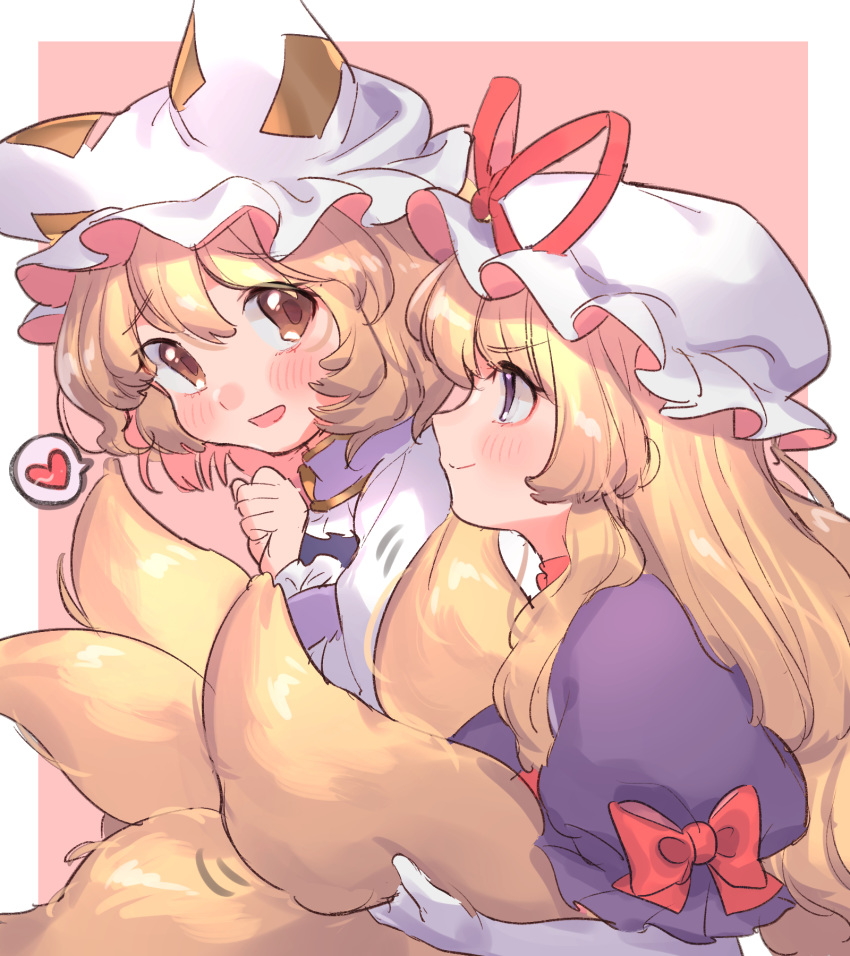 2girls :d bangs blonde_hair blush border bow brown_eyes clenched_hand commentary_request dress eyebrows_visible_through_hair fox_tail from_side gloves hair_between_eyes hand_up hat hat_ribbon heart highres long_hair looking_at_viewer masanaga_(tsukasa) mob_cap multiple_girls multiple_tails open_mouth outside_border pillow_hat pink_background profile puffy_short_sleeves puffy_sleeves purple_dress red_bow red_ribbon ribbon short_hair short_sleeves simple_background smile spoken_heart tail touhou upper_body violet_eyes white_border white_gloves white_headwear yakumo_ran yakumo_yukari yuri
