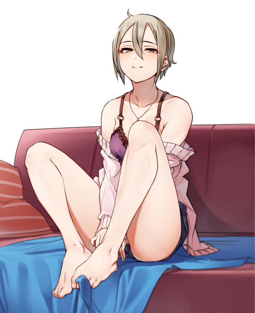 1girl bare_legs bare_shoulders barefoot bed_sheet blush brown_eyes camisole cardigan clothes_down couch frilled_camisole frills full_body grey_hair hair_between_eyes highres idolmaster idolmaster_cinderella_girls jewelry kakaobataa long_sleeves looking_at_viewer messy_hair necklace open_cardigan open_clothes pillow shiomi_shuuko short_hair short_shorts shorts sitting smile solo toes white_background