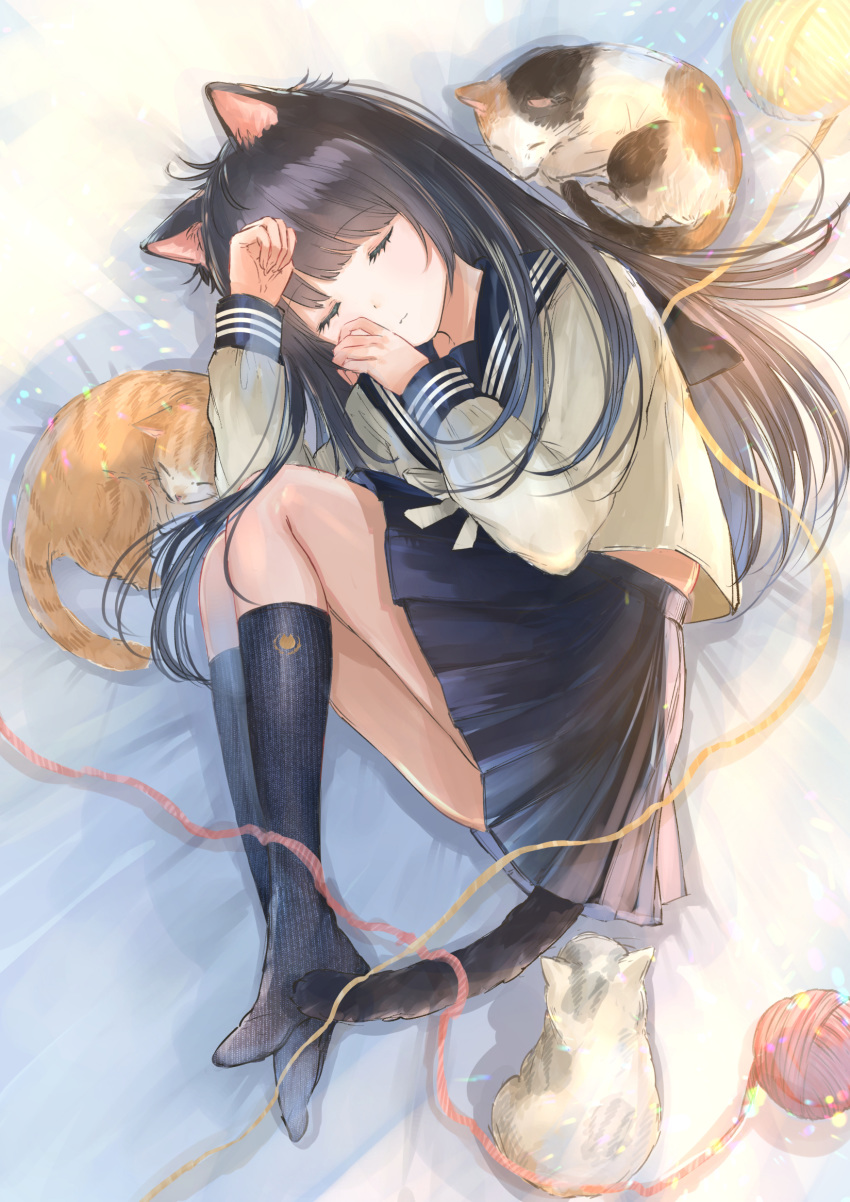 1girl animal animal_ears bangs black_hair blue_legwear blue_sailor_collar blue_skirt cat cat_ears cat_girl cat_tail closed_eyes closed_mouth commentary_request eyebrows_visible_through_hair from_above full_body highres kneehighs long_hair long_sleeves lying medium_skirt mochitsuki_usa on_side original pleated_skirt sailor_collar school_uniform serafuku shirt skirt sleeping smile solo straight_hair tail very_long_hair white_shirt yarn yarn_ball