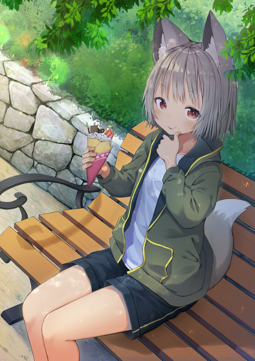 1girl alternate_costume animal_ears bench black_shorts commentary_request contemporary crepe day food food_on_face green_jacket grey_hair highres holding holding_food inubashiri_momiji jacket long_sleeves looking_at_viewer mamemochi no_headwear outdoors red_eyes shirt short_hair shorts sitting smile tail touhou white_shirt wolf_ears wolf_tail