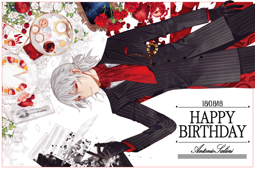 1boy antonio_salieri_(fate/grand_order) black_gloves cup dated fate/grand_order fate_(series) food formal from_above fruit gloves grey_hair happy_birthday ink lying male_focus pinstripe_suit pomegranate quill red_eyes sheet_music sindri solo spill striped suit teacup