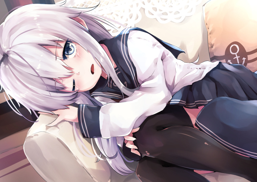 1girl black_legwear blue_eyes blush couch eyebrows_visible_through_hair hair_between_eyes hair_ornament hat hibiki_(kantai_collection) highres kantai_collection long_hair long_sleeves looking_at_viewer lying on_couch on_side one_eye_closed open_mouth pleated_skirt school_uniform serafuku silver_hair skirt solo taisho_(gumiyuki) thigh-highs