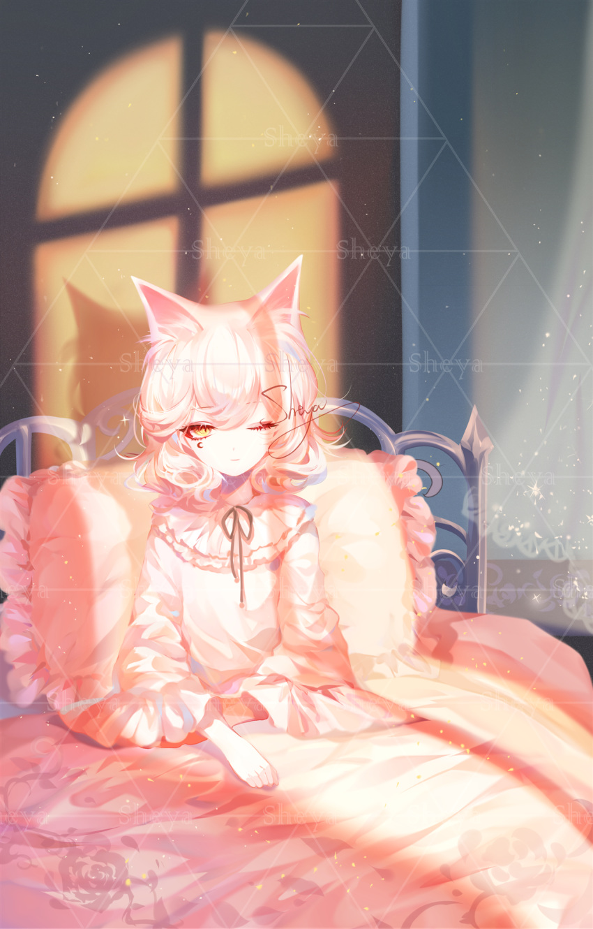 1girl animal_ears artist_name bangs bed cat_ears commentary dress hair_between_eyes highres indoors long_sleeves one_eye_closed original pillow pink_dress shadow sheya short_hair signature silver_hair solo symbol_commentary wide_sleeves yellow_eyes