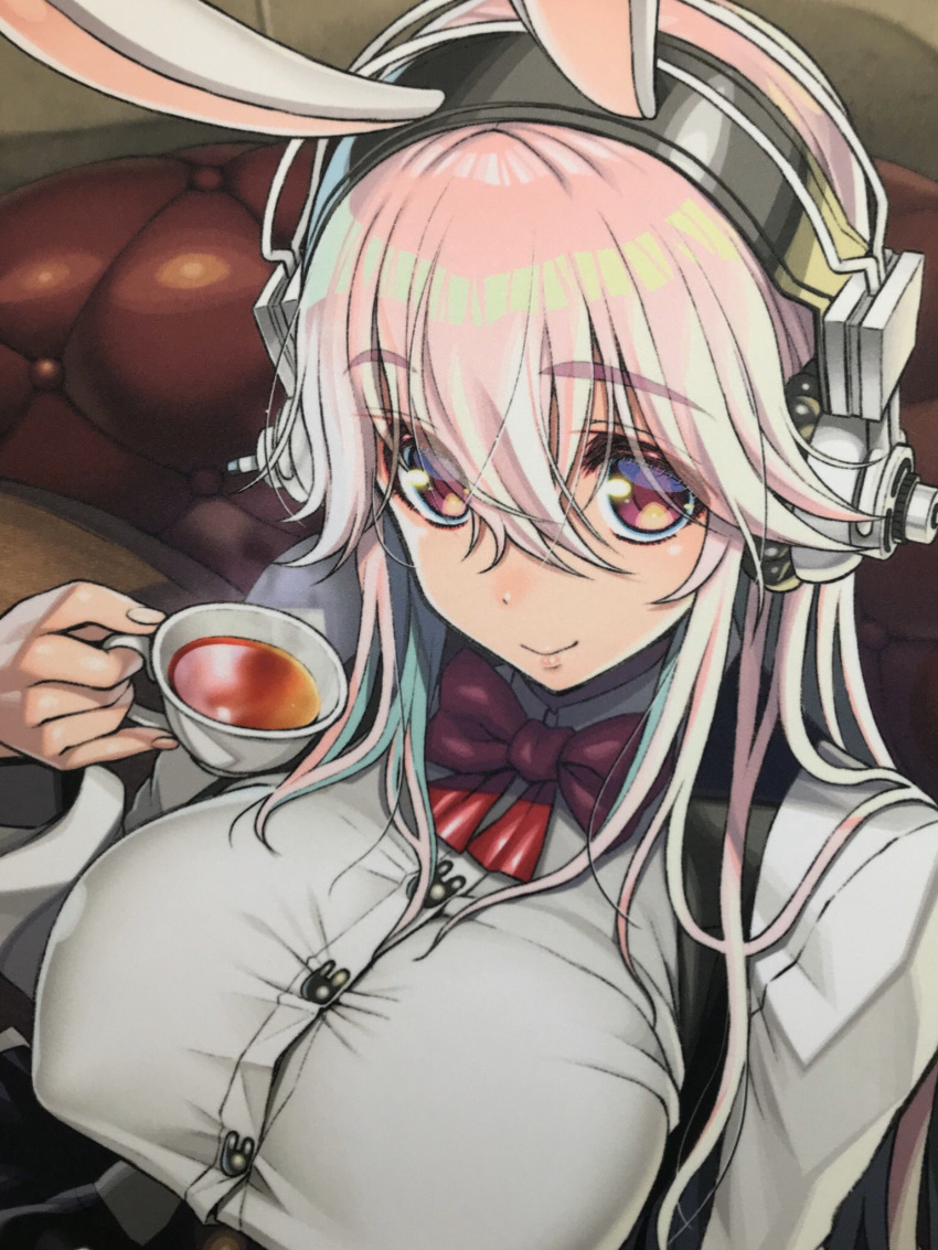 1girl animal_ears blush bow breasts closed_mouth cup eyebrows_visible_through_hair female hair_between_eyes headphones highres holding holding_cup large_breasts long_hair looking_at_viewer nitroplus pink_eyes pink_hair rabbit_ears smile solo super_sonico tea teacup tsuji_santa
