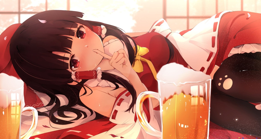1girl :o alcohol backlighting bangs beer beer_mug black_hair black_legwear blunt_bangs blush bow breasts commentary_request cup detached_sleeves eyebrows_visible_through_hair finger_to_mouth frilled_shirt_collar frilled_skirt frills hair_bow hakurei_reimu highres hunya long_sleeves lying medium_breasts mug on_floor on_side pantyhose parted_lips petals red_bow red_eyes red_skirt ribbon-trimmed_sleeves ribbon_trim shushing sidelocks skirt solo touhou wide_sleeves yellow_bow