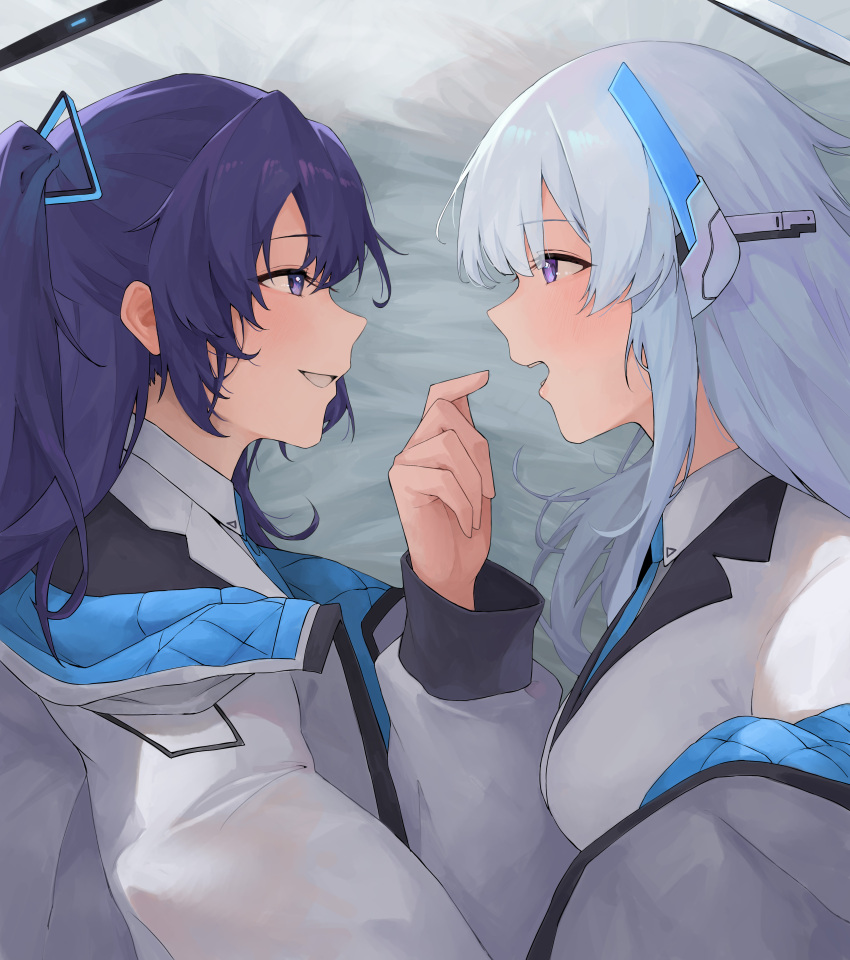 2girls absurdres bed_sheet blue_archive blush breasts eye_contact facing_another grey_hair halo highres inakanoinonaka jacket jacket_partially_removed long_sleeves looking_at_another lying medium_breasts multicolored_clothes multicolored_jacket multiple_girls noa_(blue_archive) on_side profile purple_hair smile two-tone_jacket violet_eyes yuuka_(blue_archive)