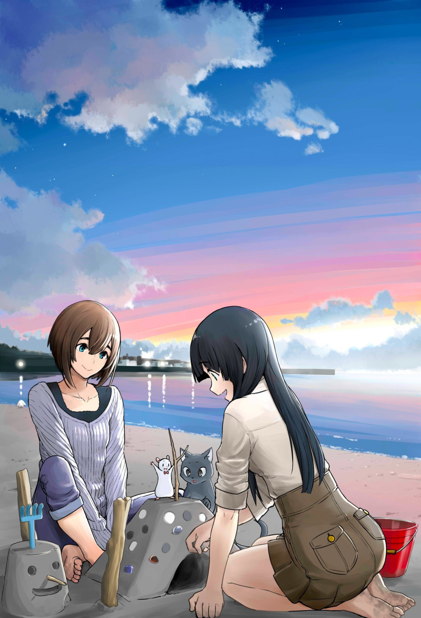 2girls al_(flying_witch) barefoot beach butterfly_sitting cat chito_(flying_witch) clouds cloudy_sky denim eyebrows eyebrows_visible_through_hair flying_witch gradient_sky hamster high-waist_skirt highres inukai_(flying_witch) ishizuka_chihiro jeans kowata_makoto landscape multiple_girls ocean outdoors pants pocket sand sand_castle sand_sculpture seiza sitting skirt sky sunset