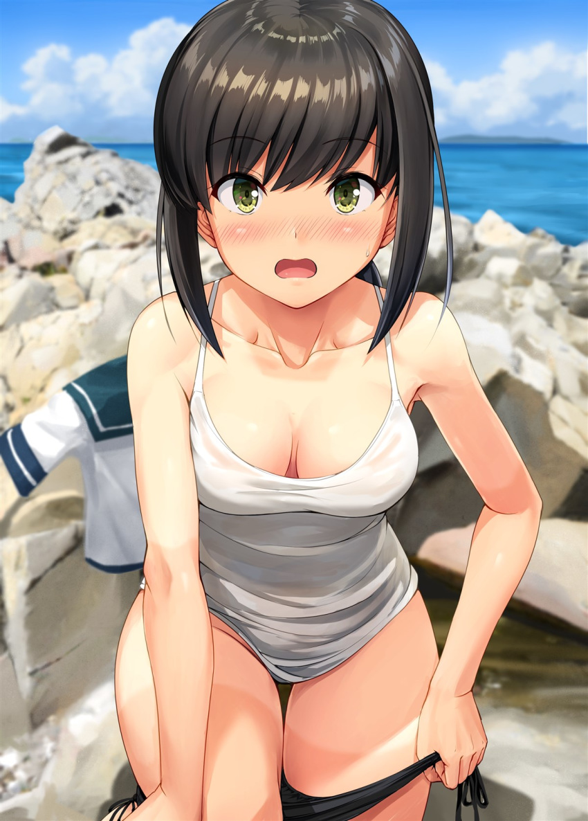 1girl black_hair blue_sky blush breasts camisole clouds cloudy_sky collarbone commentary day eyebrows_visible_through_hair feet_out_of_frame fubuki_(kantai_collection) green_eyes highres ichikawa_feesu kantai_collection looking_at_viewer medium_breasts ocean open_mouth rock school_uniform serafuku short_hair short_ponytail short_sleeves sky solo spaghetti_strap undressing