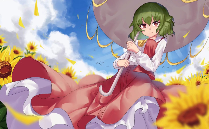 1girl aiza-ku blue_sky blurry_foreground breasts clouds commentary green_hair highres holding holding_umbrella kazami_yuuka leaf long_skirt long_sleeves looking_at_viewer parasol red_eyes red_skirt red_vest shirt short_hair skirt skirt_set sky smile solo touhou umbrella vest white_shirt wind