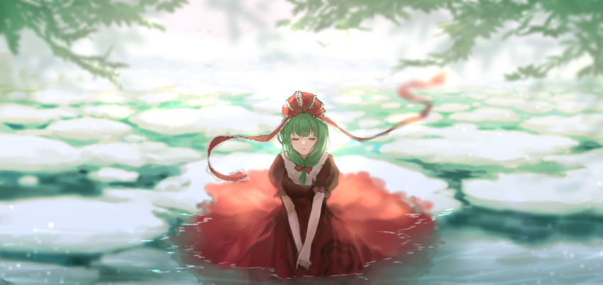 1girl absurdres closed_eyes closed_mouth commentary croci dress front_ponytail green_hair hair_ribbon hands_together highres kagiyama_hina kneeling looking_at_viewer medium_hair partially_submerged puffy_short_sleeves puffy_sleeves red_dress red_ribbon ribbon scenery short_sleeves solo touhou tree tress_ribbon water