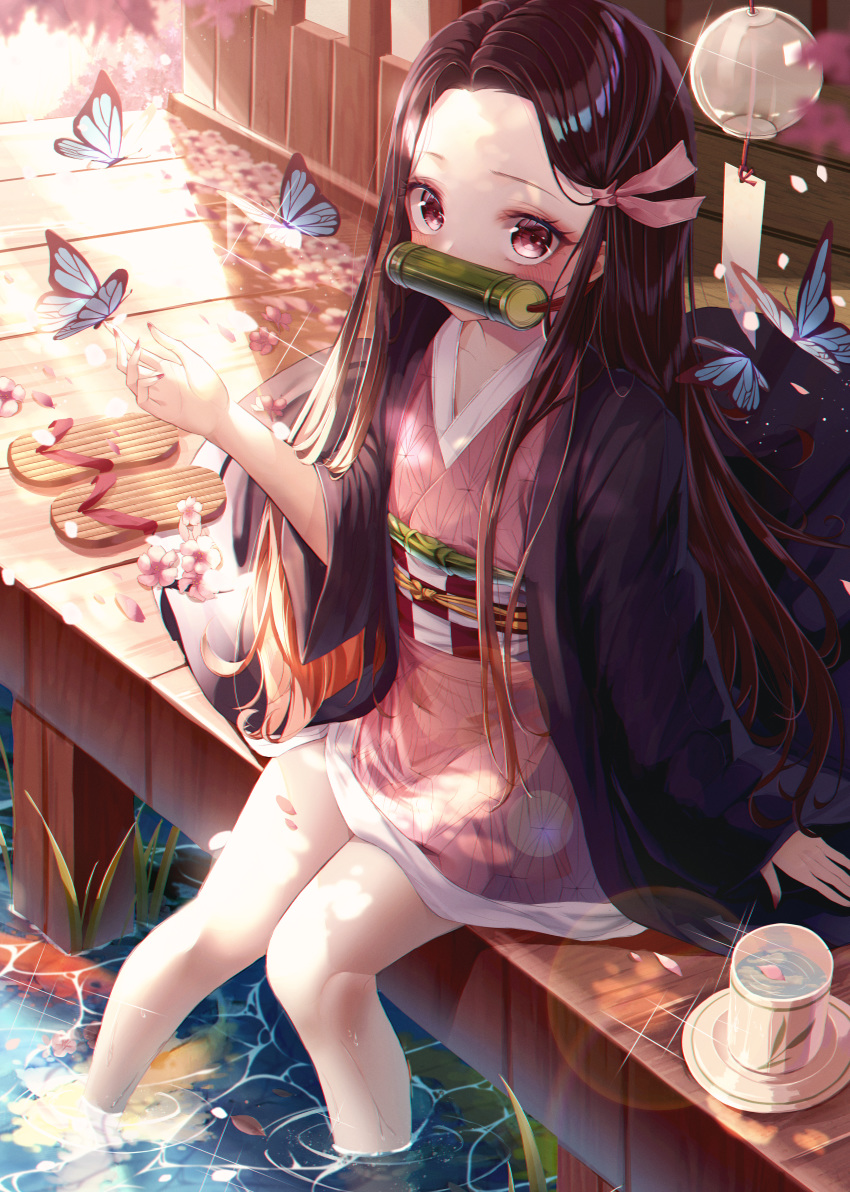 1girl absurdres bamboo bangs bit_gag blurry blurry_background blush brown_footwear brown_hair bug butterfly collarbone commentary cup day depth_of_field eumi_114 flower forehead gag hair_ribbon highres huge_filesize insect japanese_clothes kamado_nezuko kimetsu_no_yaiba kimono long_hair long_sleeves looking_at_viewer mouth_hold mug open_clothes outdoors parted_bangs petals petals_on_liquid pink_flower pink_kimono pink_ribbon reflection ribbon ripples saucer sitting sleeves_past_wrists soaking_feet solo sunlight very_long_hair water wet wide_sleeves wind_chime zouri