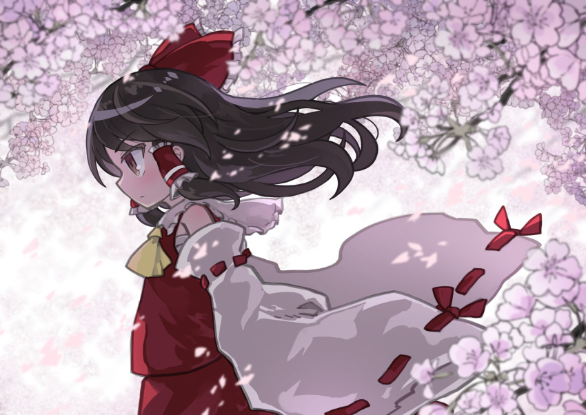 1girl ascot black_hair blurry blurry_foreground bow branch brown_eyes cherry_blossoms commentary_request depth_of_field detached_sleeves floating_hair flower frilled_shirt_collar frills from_side hair_bow hair_tubes hakurei_reimu highres kibisake long_hair long_sleeves looking_away petals profile purple_flower red_bow red_shirt red_skirt ribbon-trimmed_sleeves ribbon_trim sarashi shirt skirt sleeveless sleeveless_shirt solo touhou tree_branch upper_body white_sleeves wide_sleeves wind yellow_neckwear