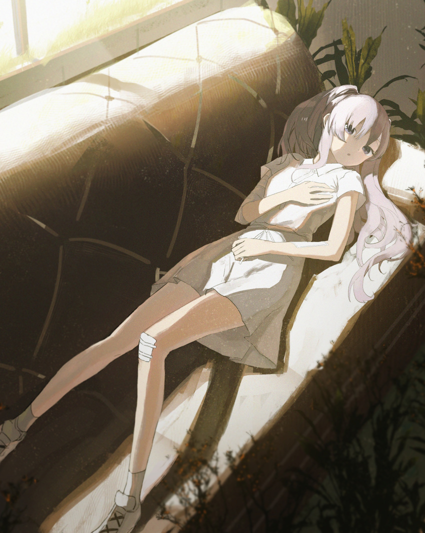 1girl absurdres asteroid_ill bandages bandaid bangs couch dress highres idolmaster idolmaster_shiny_colors indoors long_hair looking_at_viewer lying on_back on_couch open_mouth plant potted_plant short_sleeves sidelocks silver_hair solo sunlight twintails violet_eyes white_dress white_footwear white_legwear yuukoku_kiriko