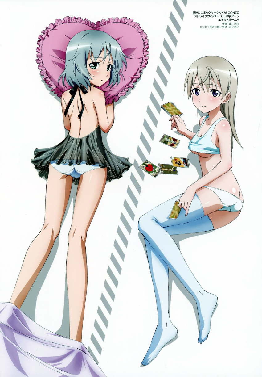 2girls absurdres ass black_dress blue_eyes blush breasts butt_crack closed_mouth dress eila_ilmatar_juutilainen eyebrows_visible_through_hair green_eyes grey_hair heart heart_pillow highres long_hair looking_at_viewer looking_back lying medium_breasts multiple_girls official_art on_stomach open_mouth panties pillow sanya_v_litvyak shiny shiny_hair short_dress short_hair shoulder_blades simple_background smile strike_witches thigh-highs under_boob underwear white_background white_hair white_legwear white_panties world_witches_series yamakawa_kouji