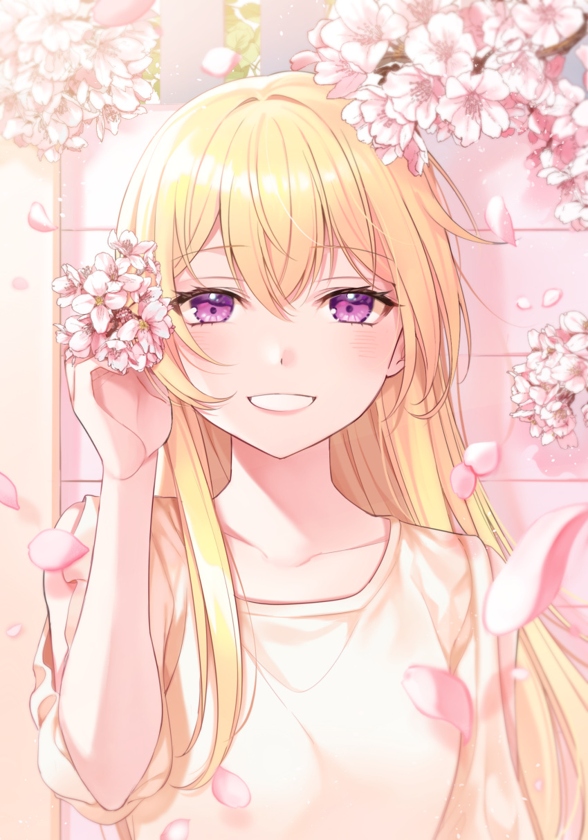 1girl bang_dream! bangs blonde_hair blush breasts cherry_blossoms collarbone commentary_request eyebrows_visible_through_hair falling_petals fence flower grin hair_between_eyes hand_up highres holding holding_flower long_hair looking_at_viewer minori_(faddy) shirasagi_chisato shirt short_sleeves shoulder_cutout sidelocks small_breasts smile solo standing tree_branch upper_body violet_eyes yellow_shirt
