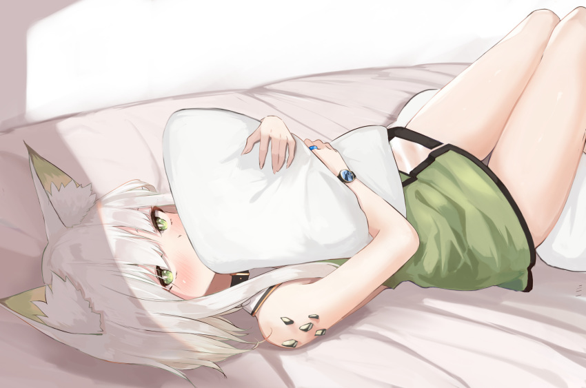 1girl animal_ear_fluff animal_ears arknights bangs bare_arms bare_shoulders bed blush dress green_dress green_eyes highres holding kal'tsit_(arknights) kashiyarrm looking_at_viewer lying on_back ore_lesion_(arknights) pillow pillow_hug short_dress short_hair silver_hair solo thighs watch watch white_background