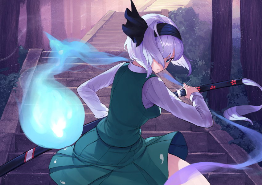 1girl amano_hagoromo backlighting bangs black_hairband black_ribbon blue_eyes breasts closed_mouth glint green_skirt green_vest hair_ribbon hairband hitodama holding holding_sword holding_weapon katana konpaku_youmu konpaku_youmu_(ghost) light_particles long_sleeves looking_at_viewer medium_breasts medium_skirt outdoors ribbon serious sheath shirt short_hair silver_hair skirt solo stairs sword tassel touhou tree unsheathing vest weapon white_shirt