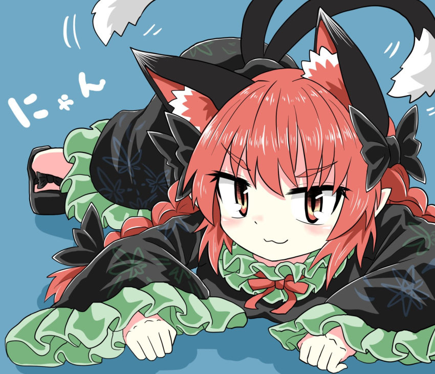 1girl :3 animal_ears bare_legs black_bow black_dress black_footwear blue_background bow braid cat_ears cat_tail chups closed_mouth dress eyebrows_visible_through_hair face fang frilled_dress frilled_sleeves frills green_frills highres long_sleeves looking_at_viewer lying multiple_tails on_stomach red_eyes red_neckwear redhead ribbon solo tail touhou twin_braids two_tails white_background