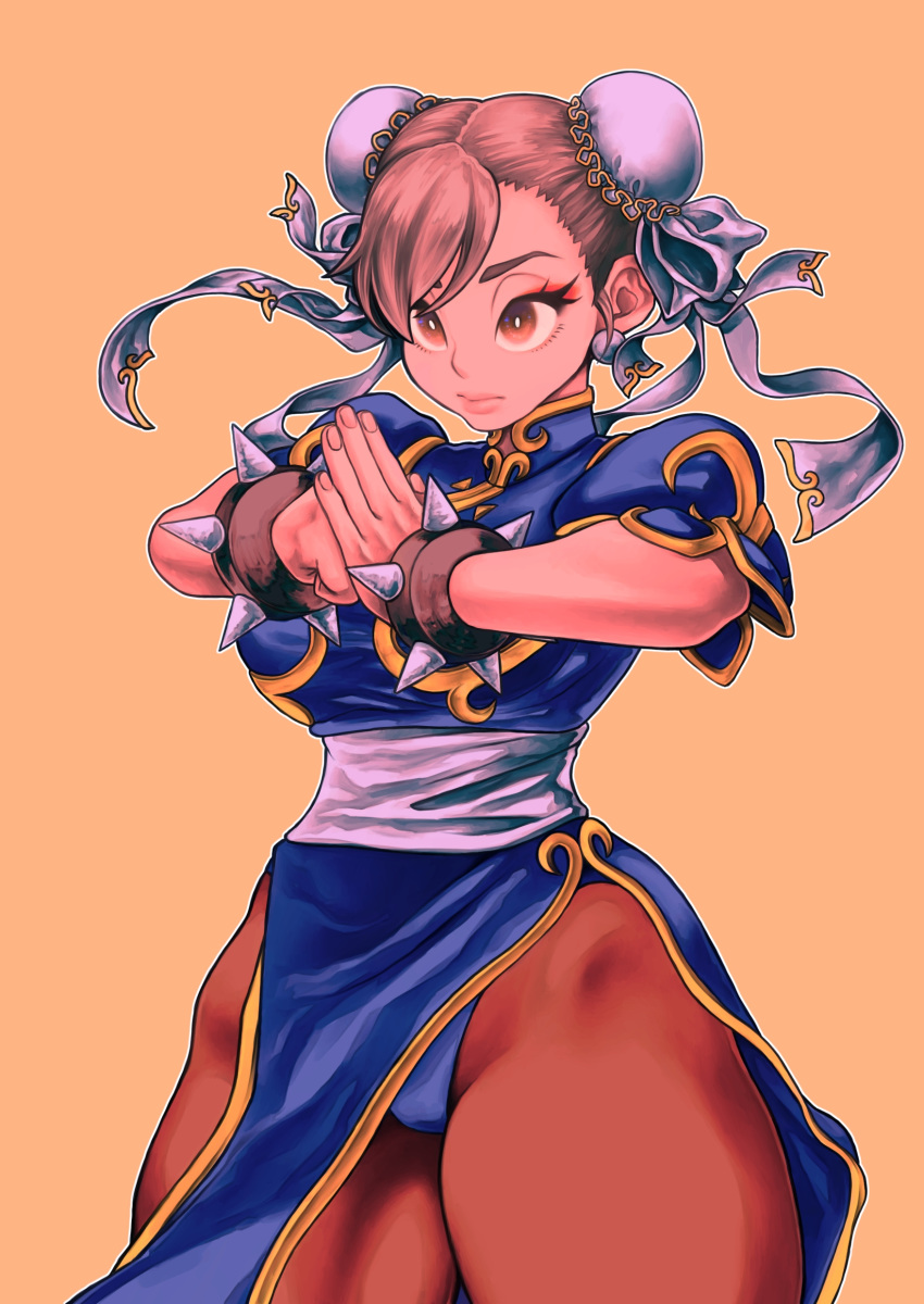 1girl absurdres akira_kou bangs blue_dress bracelet breasts brown_eyes brown_hair brown_legwear bun_cover china_dress chinese_clothes chun-li clenched_hand cowboy_shot double_bun dress earrings eyelashes eyeliner fist_in_hand highres jewelry large_breasts lips makeup own_hands_together palm-fist_greeting pantyhose pink_lips sash short_hair side_slit simple_background solo spiked_bracelet spikes street_fighter thick_thighs thighs yellow_background