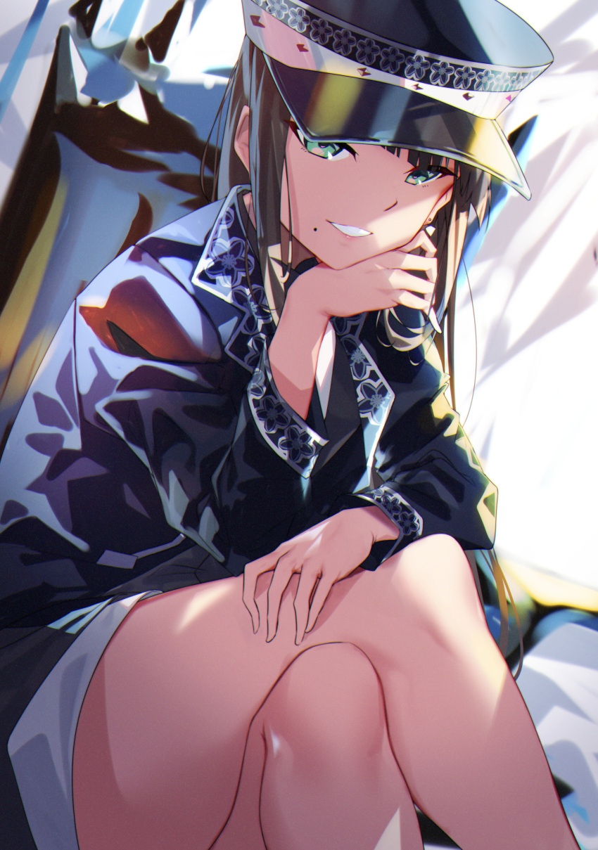 1girl absurdres alternate_costume bangs bare_legs black_headwear black_jacket blunt_bangs brown_hair commentary_request crossed_legs feet_out_of_frame green_eyes grin hand_on_own_chin highres jacket kurosawa_dia leaning_forward long_hair long_sleeves looking_at_viewer love_live! love_live!_sunshine!! mole mole_under_eye parted_lips sitting smile solo teeth yamaori_(yamaorimon)