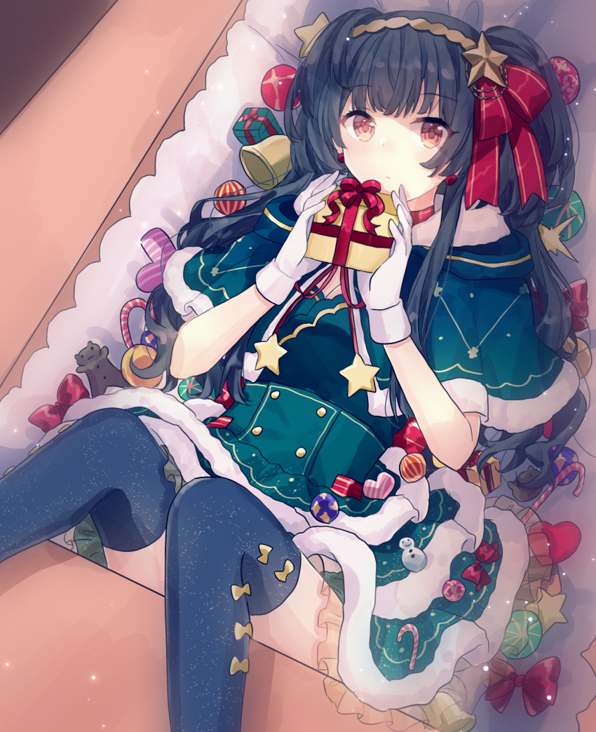 1girl bell black_hair black_legwear box brown_eyes dress earrings eyebrows_visible_through_hair fur-trimmed_dress fur_trim gift gocoli green_dress hair_ornament headband highres holding holding_gift idolmaster idolmaster_shiny_colors in_box in_container jewelry long_hair lying mayuzumi_fuyuko on_back red_ribbon ribbon solo thigh-highs two_side_up