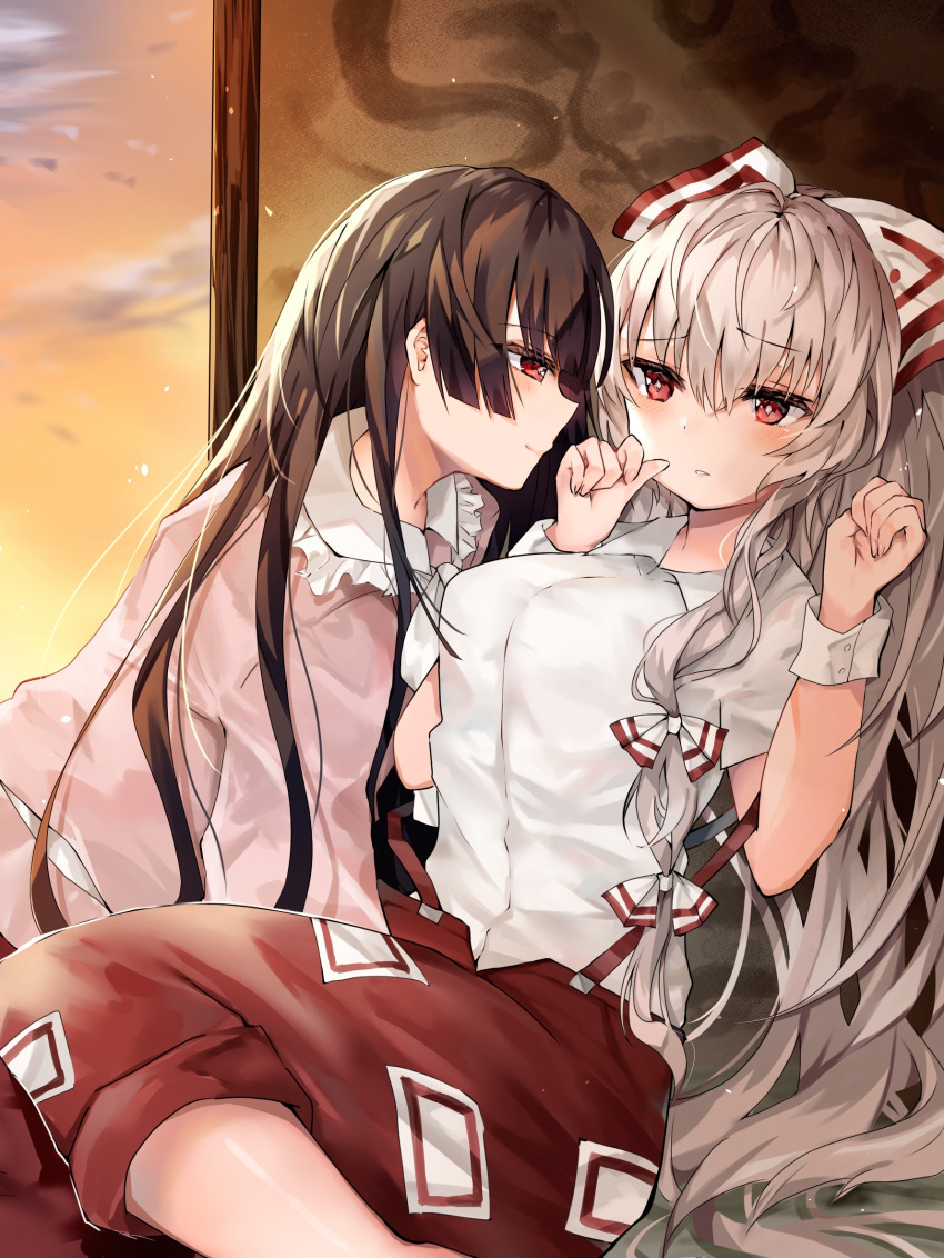 2girls adapted_costume all_fours arms_up asymmetrical_eyebrows blush breasts brown_hair clouds commentary feet_out_of_frame fujiwara_no_mokou hair_ribbon hand_on_own_face highres hiiro60 hime_cut houraisan_kaguya large_breasts leaning_back long_hair long_ponytail long_sleeves looking_at_another looking_away multiple_girls ofuda orange_sky pants pink_shirt red_eyes red_pants red_skirt ribbon screen shirt short_sleeves silver_hair sitting skirt sky smile suspenders suspenders_slip touhou twilight very_long_hair white_shirt wrist_cuffs yuri