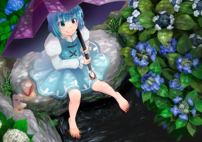 1girl barefoot blue_hair commentary_request dappled_sunlight day eyebrows_visible_through_hair feet flower footwear_removed geta green_eyes heterochromia highres holding holding_umbrella hydrangea leafy-miturugi-green long_sleeves nature outdoors photoshop_(medium) puffy_long_sleeves puffy_sleeves red_eyes rock short_hair sitting smile soaking_feet solo sunlight tatara_kogasa toes touhou umbrella water water_surface