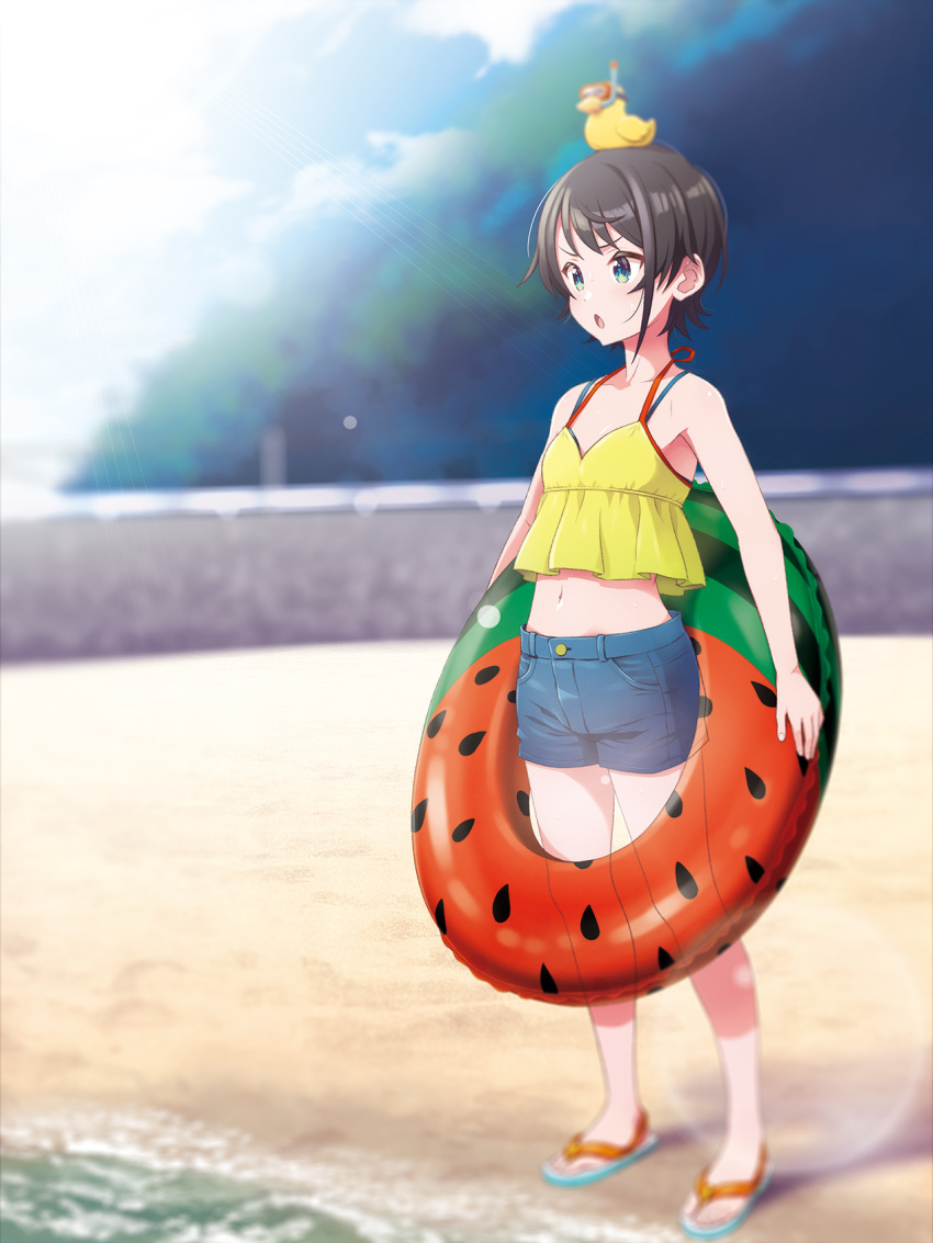 1girl alternate_costume bare_legs beach black_hair blue_eyes blue_footwear blue_shorts blurry blurry_background breasts commentary day denim denim_shorts depth_of_field food_print full_body green_eyes highres hololive innertube kabayaki_unagi midriff multicolored multicolored_eyes navel object_on_head oozora_subaru open_mouth outdoors rubber_duck sandals short_hair short_shorts shorts sleeveless small_breasts solo spaghetti_strap standing sweat thighs virtual_youtuber water watermelon_print yellow_camisole