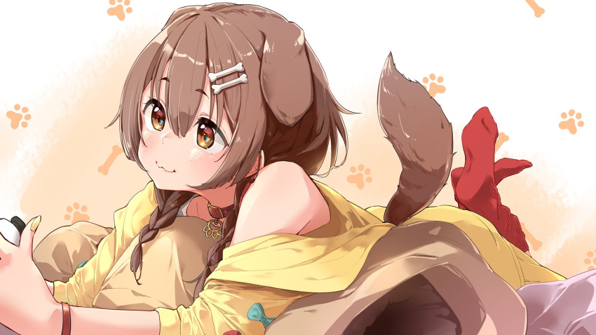 1girl :3 animal_ears blush bone_hair_ornament bone_print braid brown_eyes brown_hair choker closed_mouth commentary controller dog_ears dog_tail dress eyebrows_visible_through_hair game_controller hair_between_eyes highres holding_controller hololive inugami_korone jacket lying medium_hair nail_polish off_shoulder on_stomach patterned_background paw_print_background red_choker red_legwear side_braids simple_background smile socks solo tail twin_braids virtual_youtuber white_dress wristband yellow_jacket yellow_nails yuyaiyaui