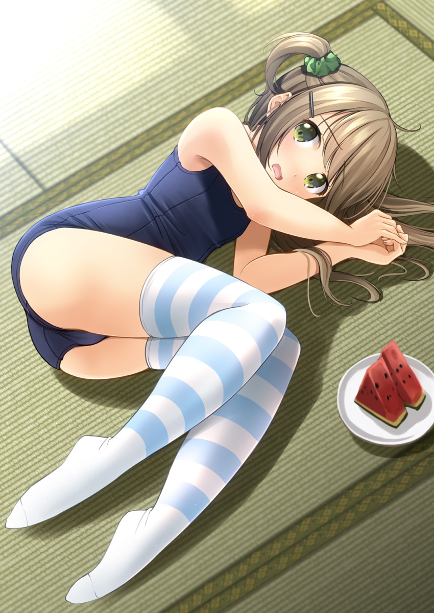 1girl arms_up ass bangs bare_arms bare_shoulders blue_swimsuit blush brown_hair commentary_request eyebrows_visible_through_hair food fruit green_eyes green_scrunchie hair_ornament hair_scrunchie hairclip highres lying no_shoes on_floor on_side one-piece_swimsuit open_mouth original plate school_swimsuit scrunchie shibacha side_ponytail solo striped striped_legwear swimsuit tatami thigh-highs watermelon