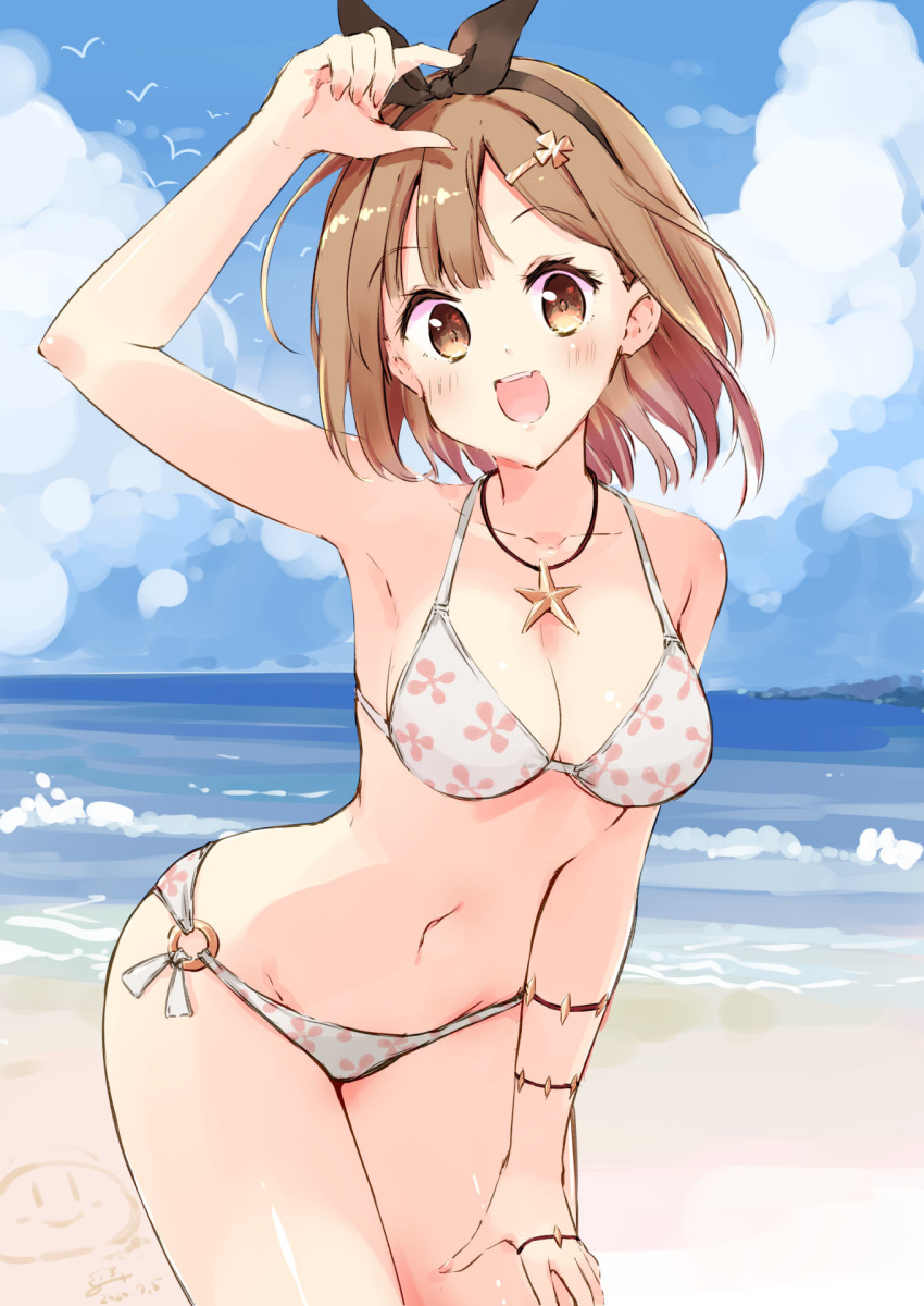 1girl :d armpits atelier_(series) atelier_ryza beach bikini black_hairband blue_sky breasts brown_eyes brown_hair clouds commentary_request eyebrows_visible_through_hair hair_ornament hairband hairclip hand_up highres jewelry looking_at_viewer medium_breasts minidraco navel necklace o-ring o-ring_bottom ocean open_mouth outdoors reisalin_stout sand short_hair sky smile solo star_(symbol) star_necklace swimsuit water white_bikini