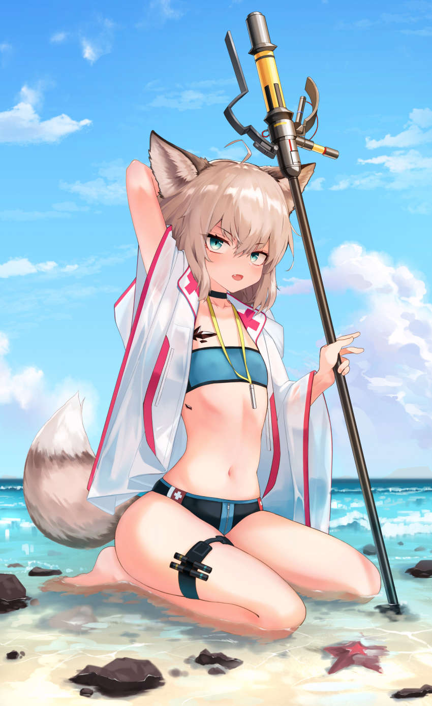 1girl absurdres ahoge animal_ears arknights arm_up bandeau bangs bare_legs barefoot beach bikini blue_sky blush clouds commentary day eyebrows_visible_through_hair fang fox_ears fox_tail green_eyes hair_between_eyes highres holding holding_staff jacket looking_at_viewer navel ocean open_clothes open_jacket open_mouth ore_lesion_(arknights) outdoors seiza short_hair silver_hair sitting sky solo staff starfish stomach sussurro_(arknights) swimsuit tail thigh_strap thighs timitarcat water white_jacket