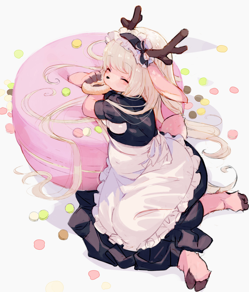 1girl animal_ears antlers apron arm_rest black_dress blonde_hair closed_eyes commentary_request deer_ears deer_tail doughnut dress eating food furry highres hooves kishibe long_hair macaron maid maid_headdress original paws reindeer_antlers simple_background sitting solo tail tona_(kishibe) white_apron white_background