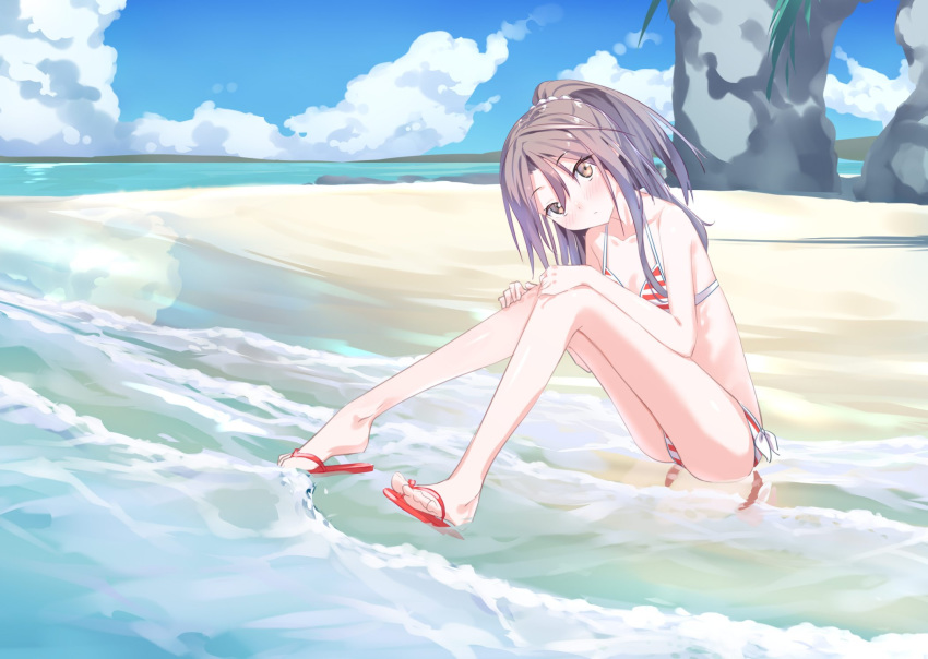 1girl beach bike_shorts blue_sky brown_eyes clouds day flat_chest full_body grey_hair head_tilt high_ponytail highres kantai_collection long_hair looking_at_viewer natsuki_(gedo) ocean outdoors partially_submerged sandals sky solo striped striped_bike_shorts waves zuihou_(kantai_collection)