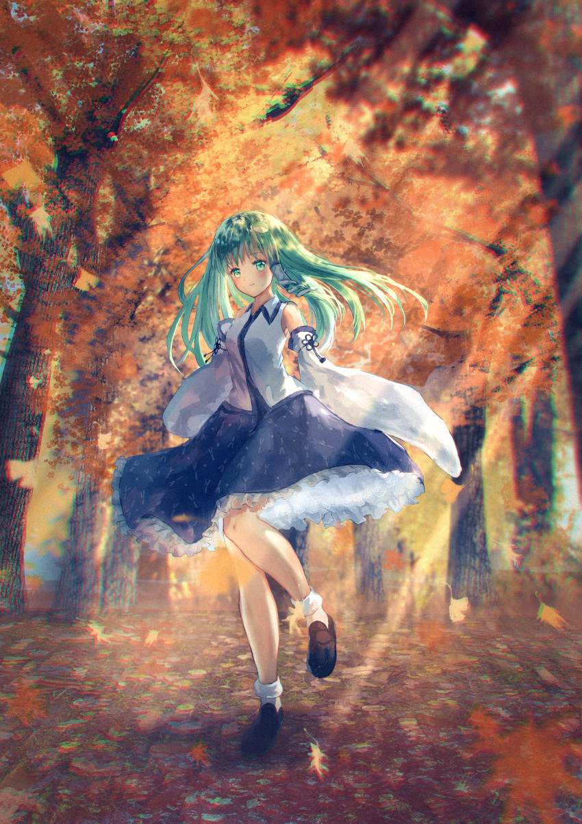 1girl autumn bangs blue_skirt brown_footwear closed_mouth collared_shirt commentary_request dappled_sunlight day detached_sleeves eyebrows_visible_through_hair frilled_skirt frills frog_hair_ornament green_eyes green_hair hair_ornament highres kochiya_sanae kotomi_alpaca leaf light_rays loafers looking_at_viewer outdoors shirt shoes skirt smile solo standing sunbeam sunlight touhou tree white_legwear white_shirt wide_sleeves