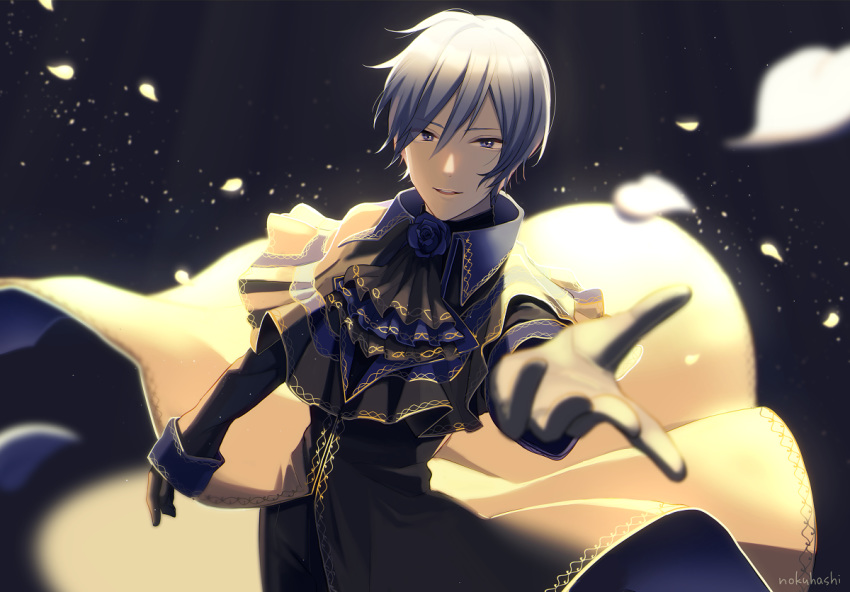 1boy artist_name black_background black_capelet black_gloves black_robe blue_eyes blue_hair blurry_foreground capelet commentary falling_petals foreshortening gloves kaito looking_at_viewer male_focus nokuhashi outstretched_arm parted_lips petals project_diva_(series) reaching_out rosa_blue_(module) smile spotlight upper_body vocaloid