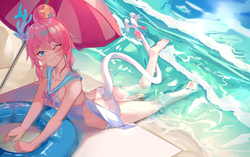 1girl absurdres barefoot beach beach_umbrella blue_eyes blush commentary_request day fang flower from_above hair_bun hair_flower hair_ornament highres honkai_(series) honkai_impact_3rd innertube long_hair looking_at_viewer lying ocean on_stomach one_eye_closed outdoors partial_commentary pink_hair rozaliya_olenyeva sailor_collar sand skin_fang smile solo starfish_hair_ornament swimsuit tail thick_eyebrows umbrella water white_tail zhongwu_chahui