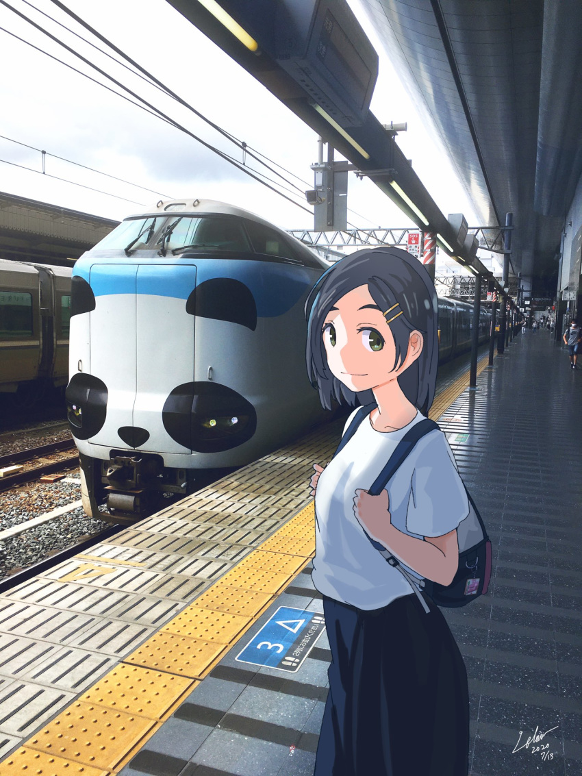 1girl alternate_costume backpack bag black_eyes black_hair black_skirt blouse commentary_request cowboy_shot ground_vehicle hair_ornament hairclip highres kantai_collection kuroshio_(kantai_collection) long_skirt looking_at_viewer outdoors photo_background railroad_tracks short_hair skirt solo tactile_paving train train_station train_station_platform utachy white_blouse