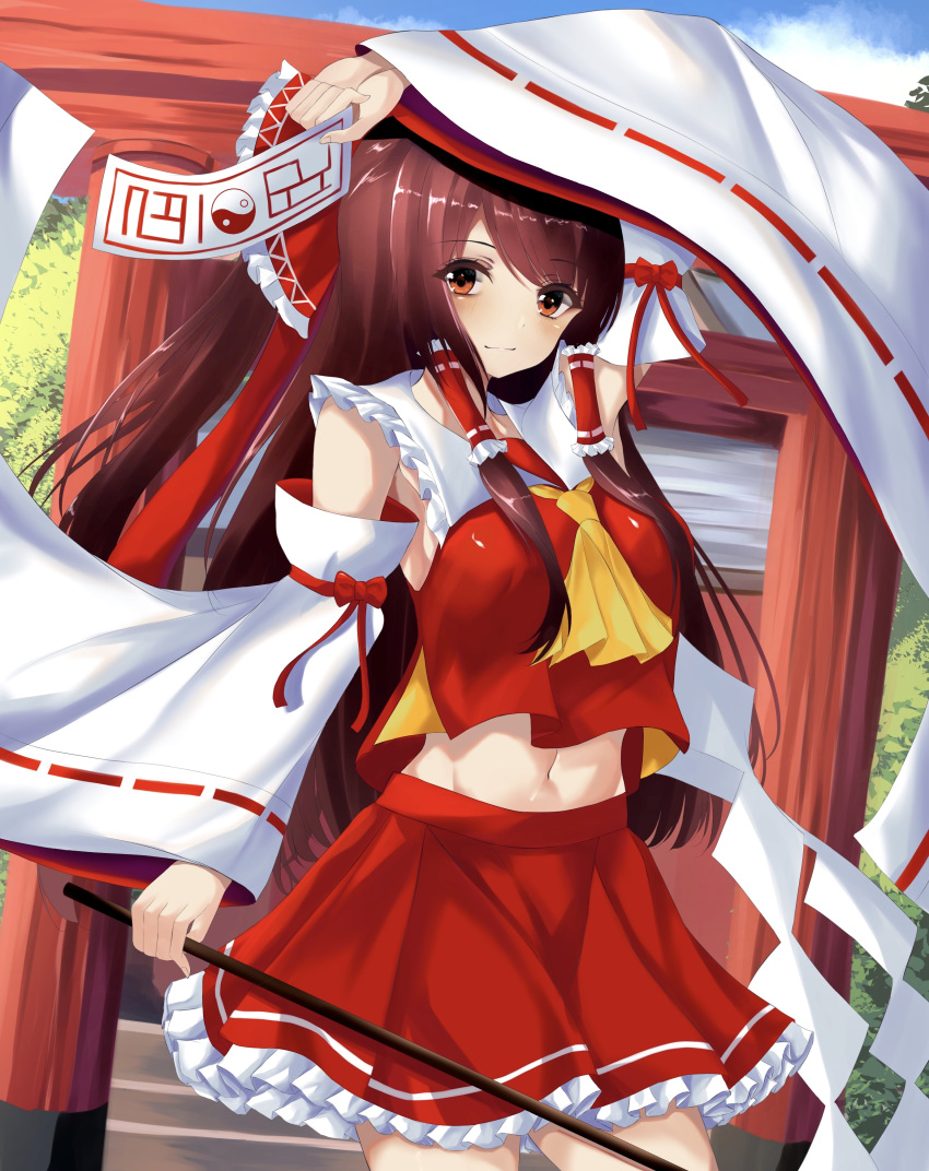 1girl absurdres arm_above_head armpit_peek bangs blue_sky breasts brown_hair clouds commentary contrapposto cowboy_shot cravat day detached_sleeves dutch_angle eyebrows_visible_through_hair gohei hair_ribbon hair_tubes hakurei_reimu highres holding holding_paper kure:kuroha long_hair looking_at_viewer medium_breasts midriff navel ofuda outdoors paper petticoat ponytail red_eyes red_skirt red_vest ribbon ribbon-trimmed_sleeves ribbon_trim sidelocks skirt sky smile solo standing swept_bangs torii touhou very_long_hair vest yellow_neckwear yin_yang
