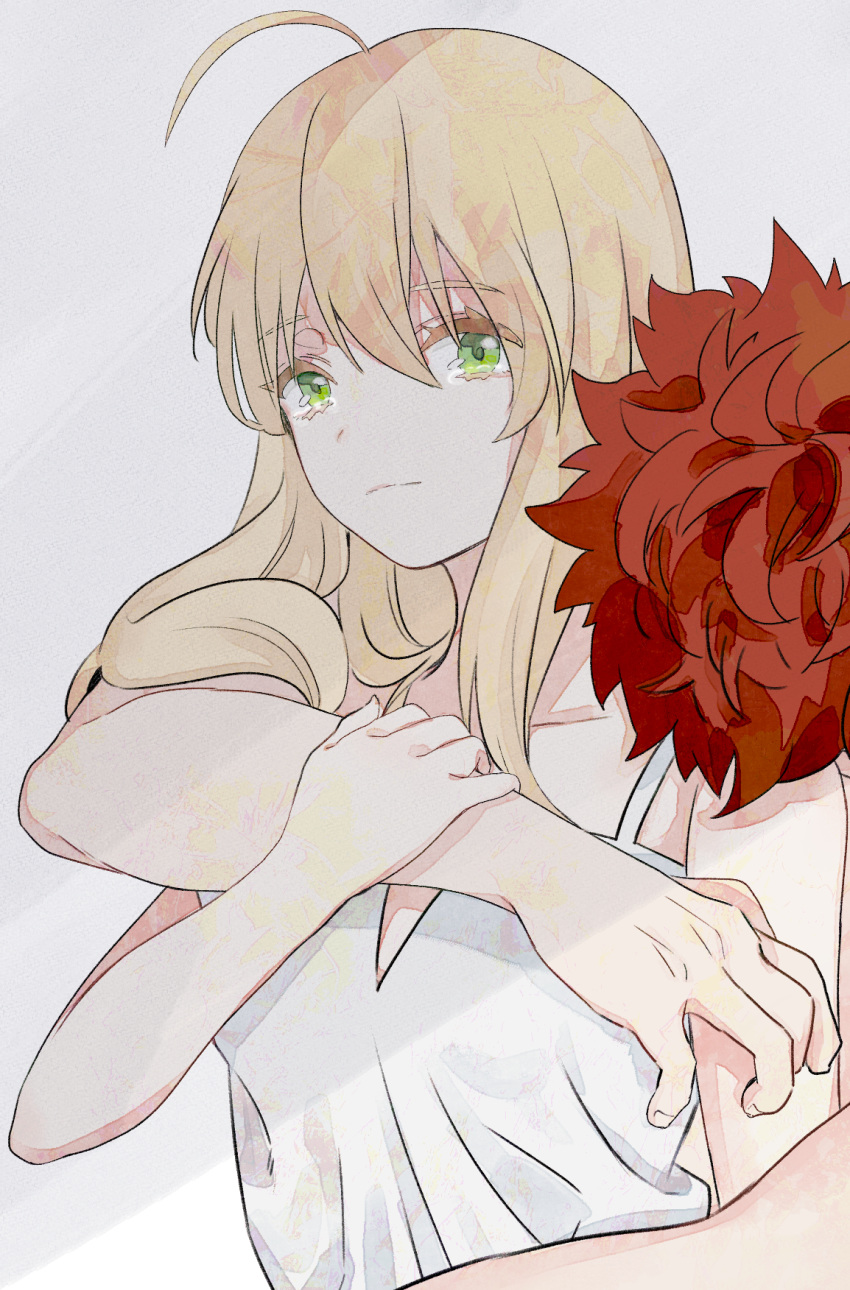 1boy 1girl ahoge artoria_pendragon_(all) bangs blonde_hair closed_mouth collarbone couple emiya_shirou eyebrows_visible_through_hair fate/stay_night fate_(series) green_eyes grey_background hair_between_eyes highres hug hug_from_behind long_hair saber sleeveless spaghetti_strap suzuakks tank_top tears upper_body