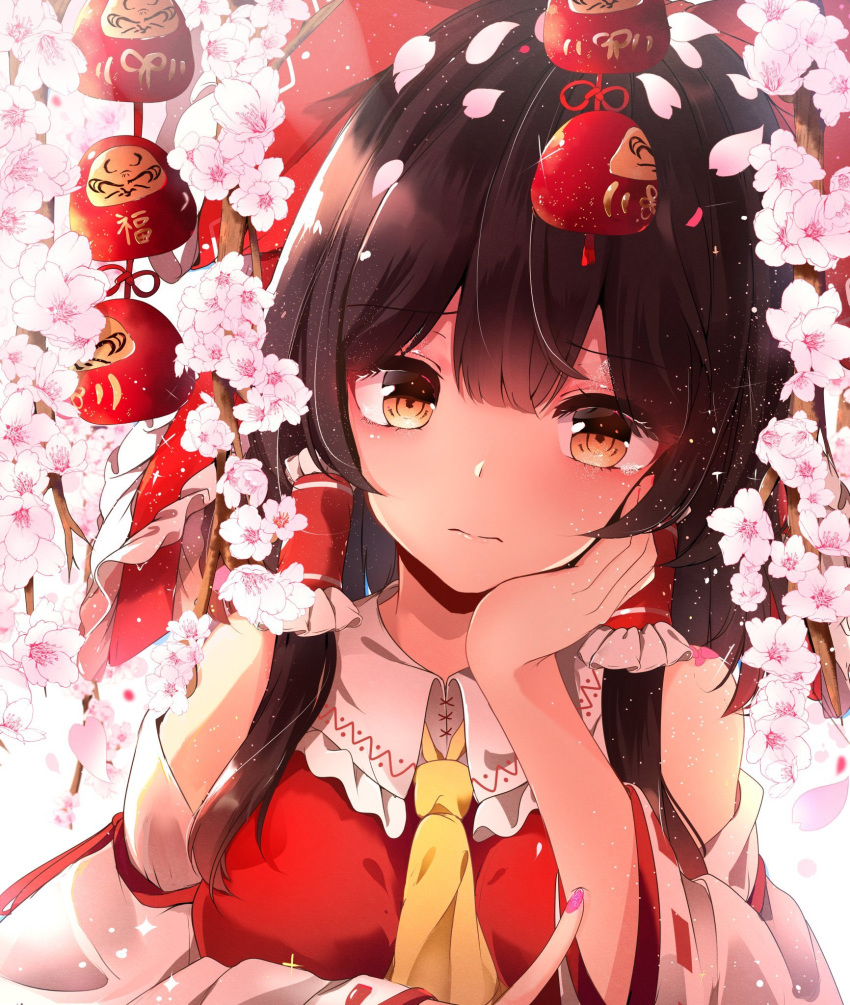 1girl bow branch brown_eyes brown_hair cherry_blossoms commentary daruma_doll detached_sleeves elbow_rest flower hair_bow hair_tubes hakurei_reimu hand_on_own_cheek hand_up highres hunya long_hair long_sleeves looking_at_viewer petals red_bow red_shirt ribbon-trimmed_sleeves ribbon_trim shirt solo sparkle touhou upper_body white_background yellow_neckwear