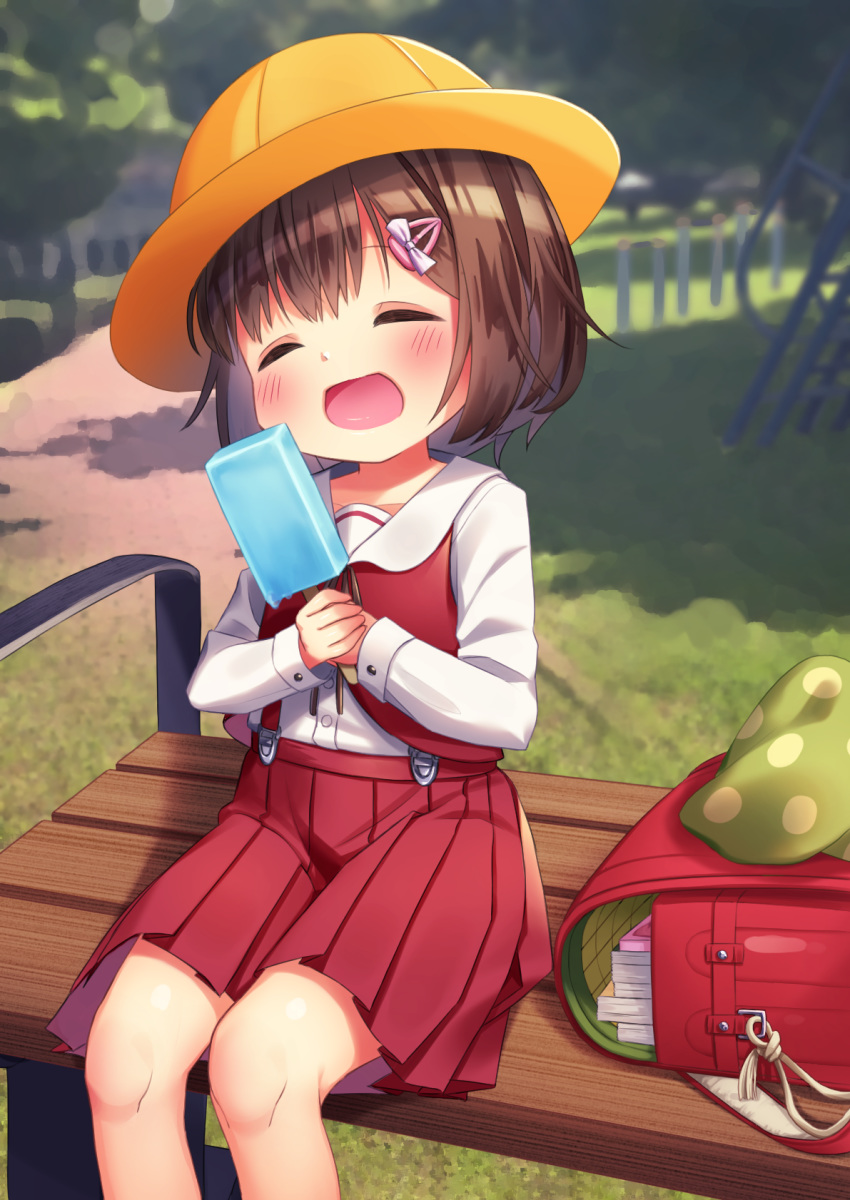 1girl backpack backpack_removed bag bench blush brown_hair child closed_eyes food hair_ornament hairclip hat highres honjo_puni ice_cream open_mouth original outdoors park popsicle randoseru red_skirt red_vest school_hat school_uniform shirt short_hair sitting skirt smile solo suspender_skirt suspenders vest white_shirt yellow_headwear