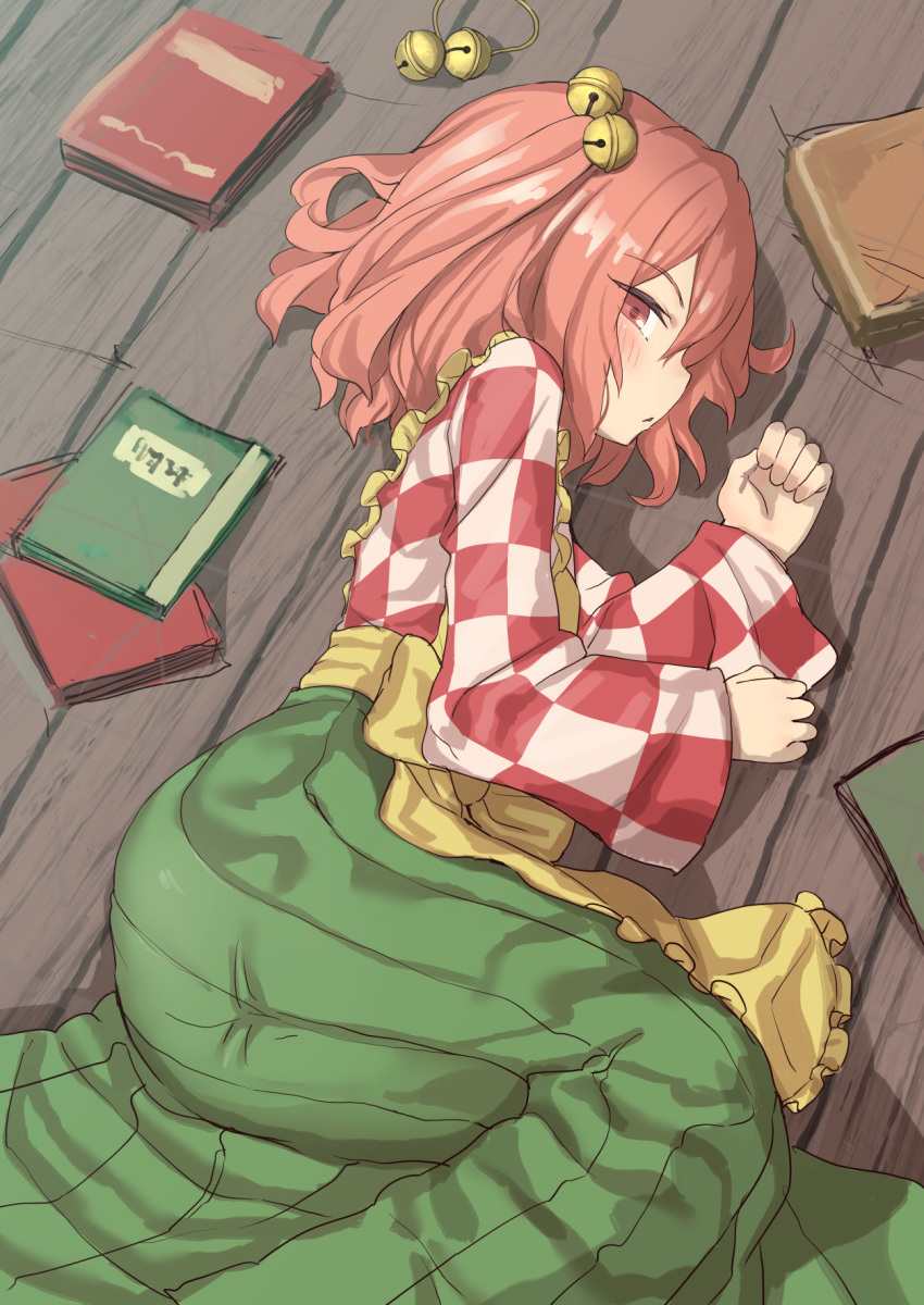 1girl apron bell book checkered checkered_kimono green_skirt hair_bell hair_ornament highres isemori japanese_clothes kimono long_sleeves looking_at_viewer lying medium_hair motoori_kosuzu on_floor on_side profile red_eyes redhead skirt solo touhou wide_sleeves wooden_floor